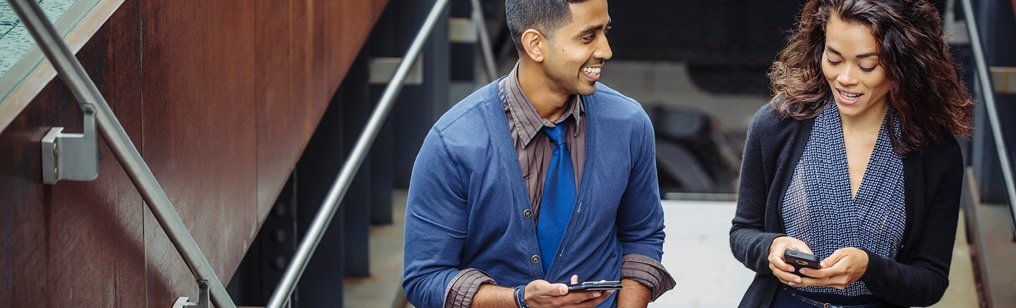 Colleagues smiling and talking