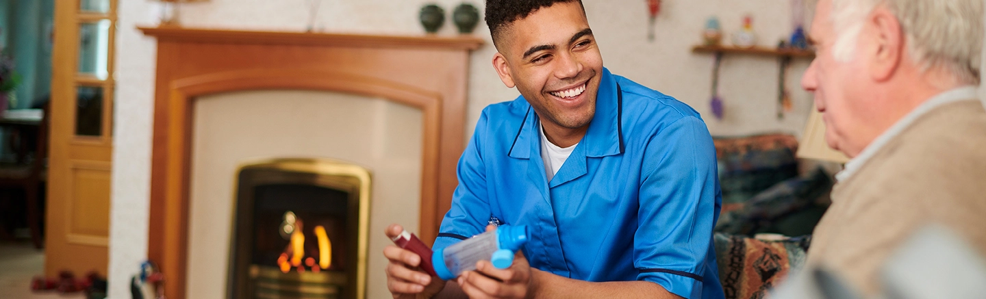 Healthcare professional smiling with patient