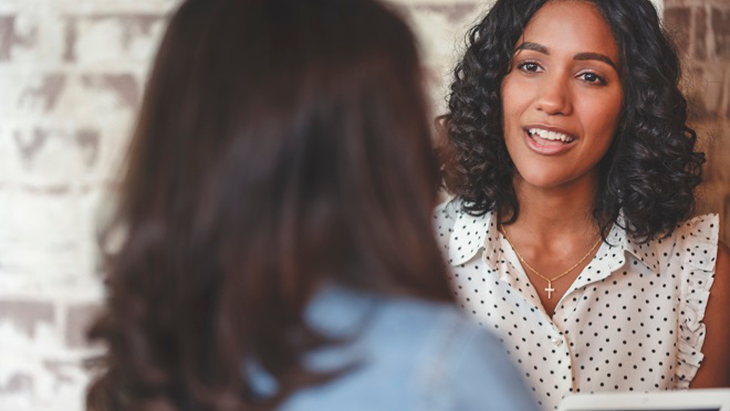 two women having a conversation 